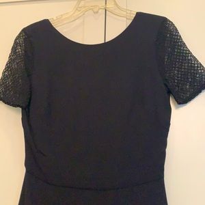 Black sheer sleeve, scoop back mini dress